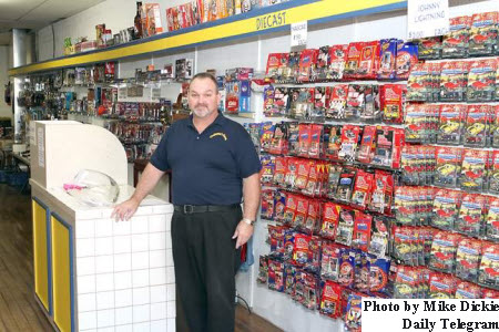 Matt Woznicki inside Collector's King shop. Matt Woznicki, owner of Collector's King, inside his shop on Main Street in Morenci, Michigan.